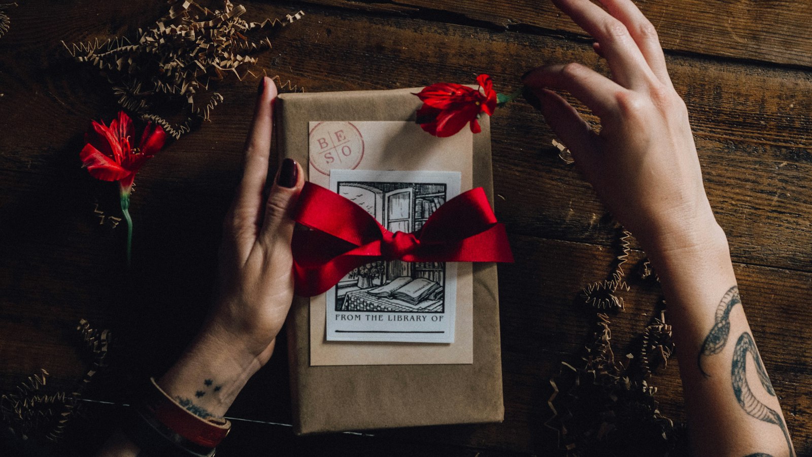 red ribbon on white greeting card