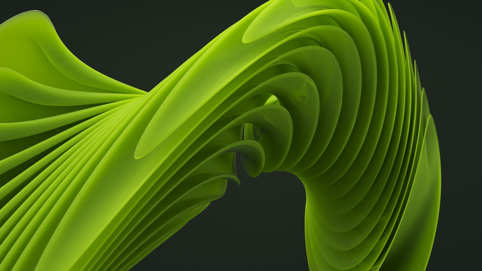 A close up of a green object on a black background