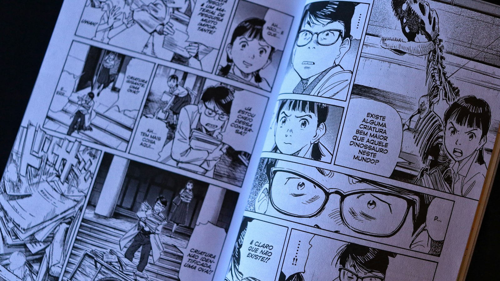 Open comic book with panels and dialogue bubbles